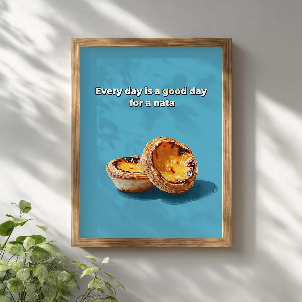 Portuguese pastel de nata custard tart poster in a wooden frame on a white wall with plant decor, quirky modern kitchen print mockup.