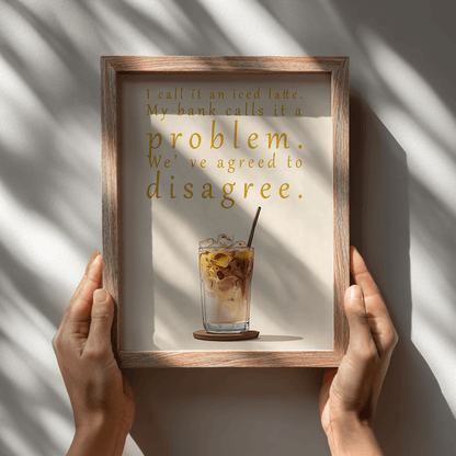 Minimalist witty ice coffee poster held in wooden frame showing modern kitchen wall decor design

