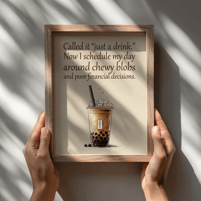 Playful bubble tea quote poster with inspirational text displayed in wooden frame being held by hands

